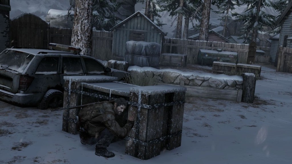 joel crouches behind crate 1406594470